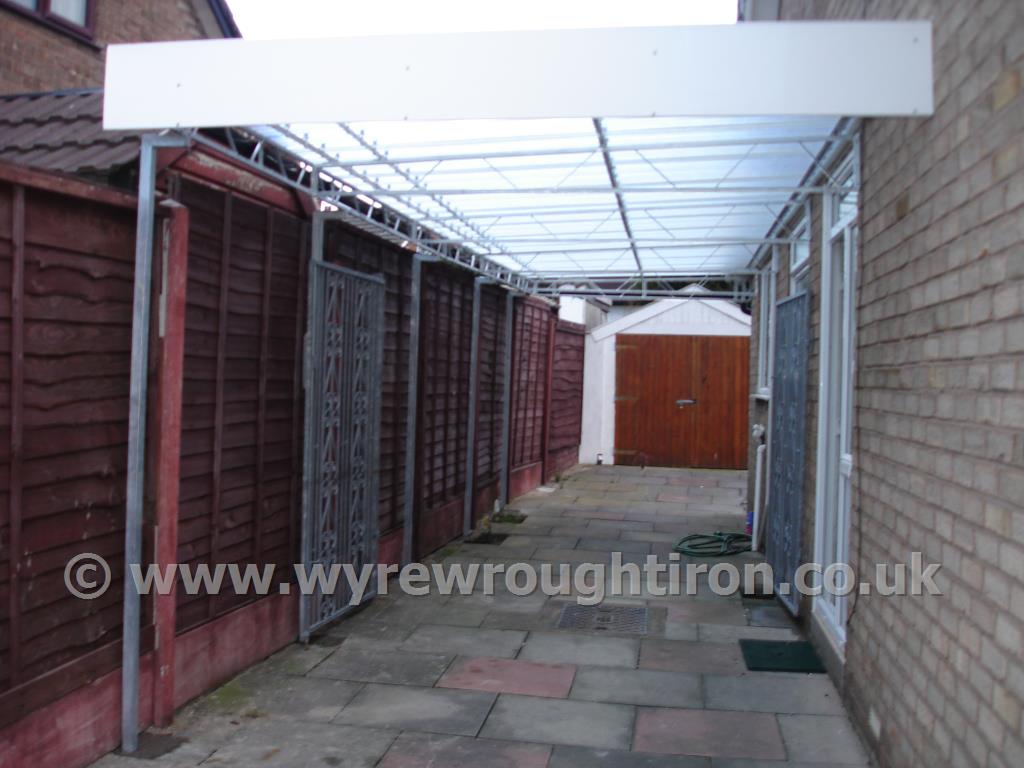 Carport in Fleetwood with space for two cars and providing sheltered access to the property.