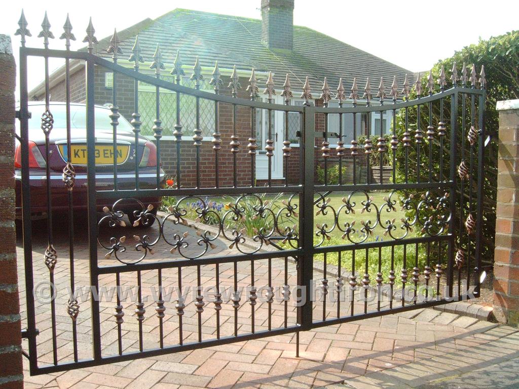 Photo - Double gates with drop arches created for a customer in Rossall, Fleetwood